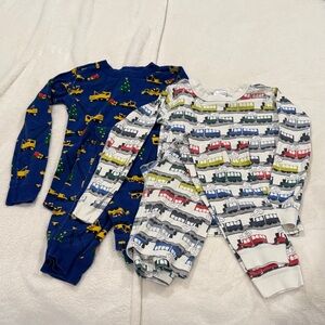 HANNA ANDERSON pajama sets. Size 8. Trains and Christmas construction vehicles.